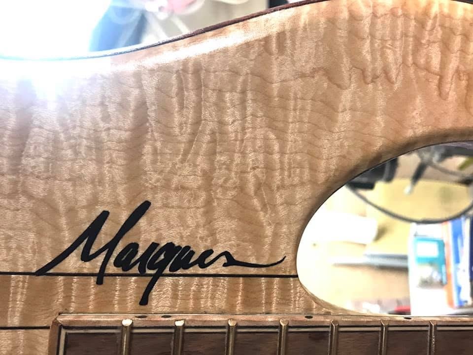 Logo & Wood Figure